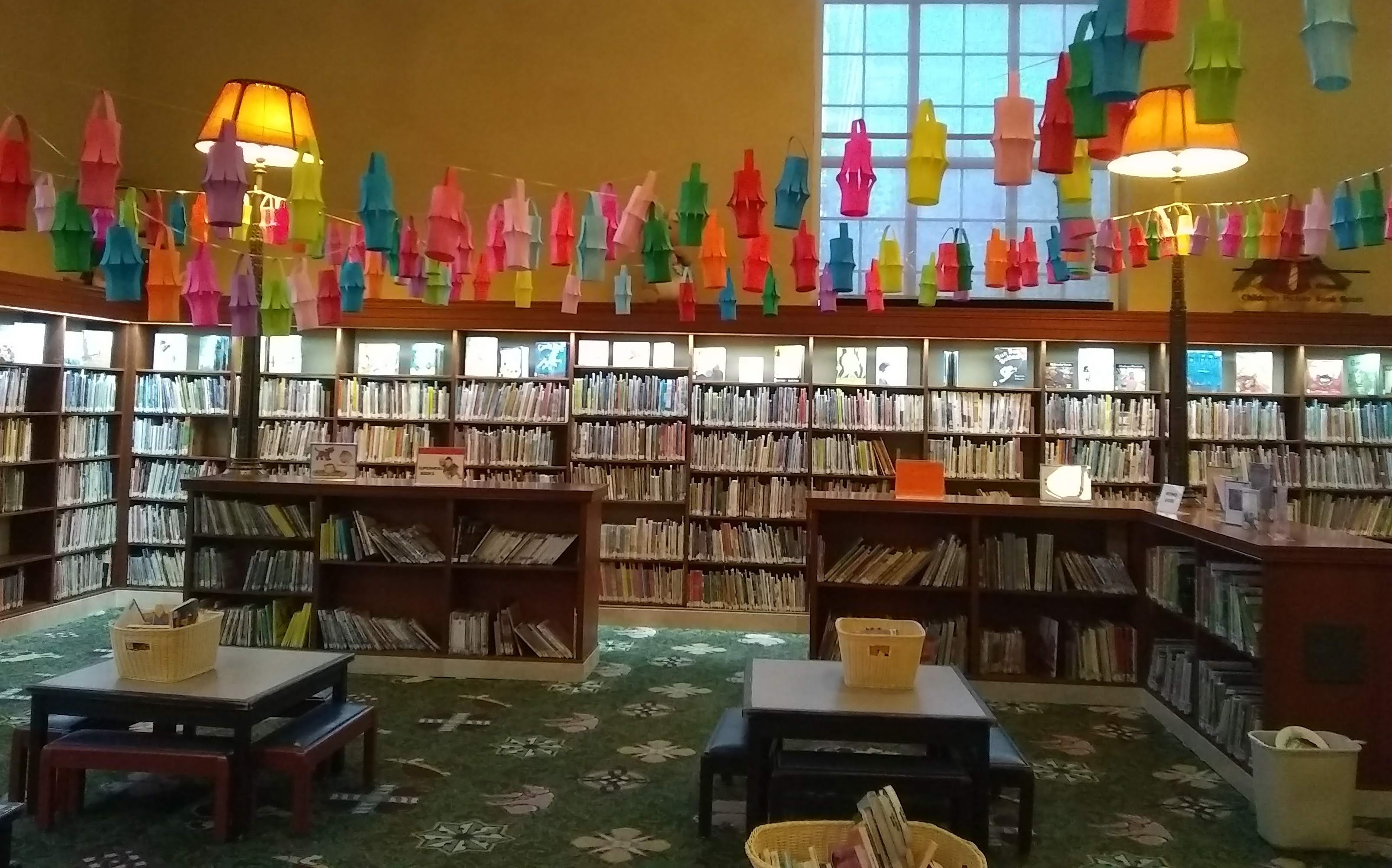 books on shelves story section childrens library